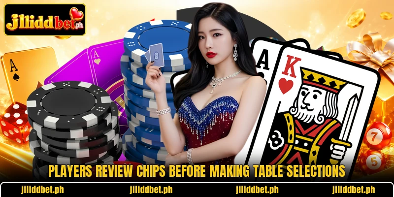 Players review chips before making table selections Players review chips before making table selections